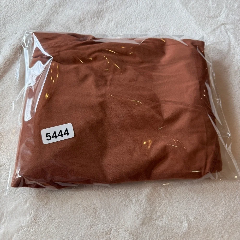 New! Free Movemnt x Free People Never Better One-Piece Brown 45444